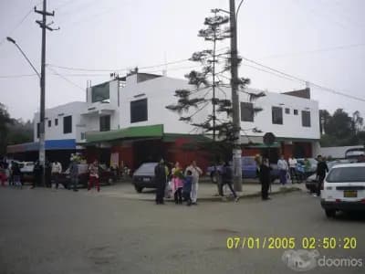 VENTA DE ACCIONES DE TERRENO Y LOCAL COMERCIAL