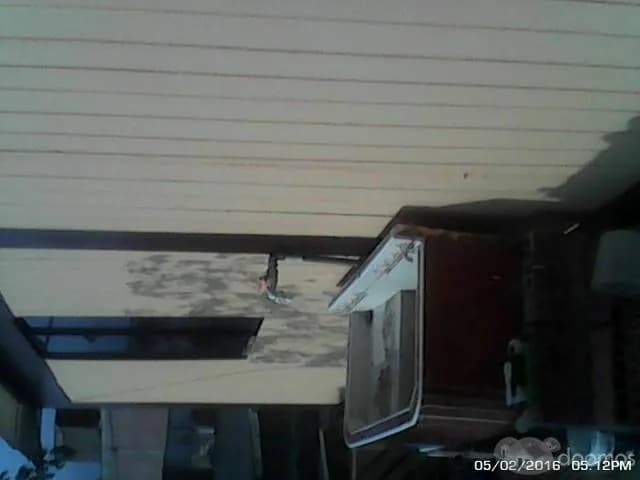 venta de terreno con casa prefabricada — foto 1